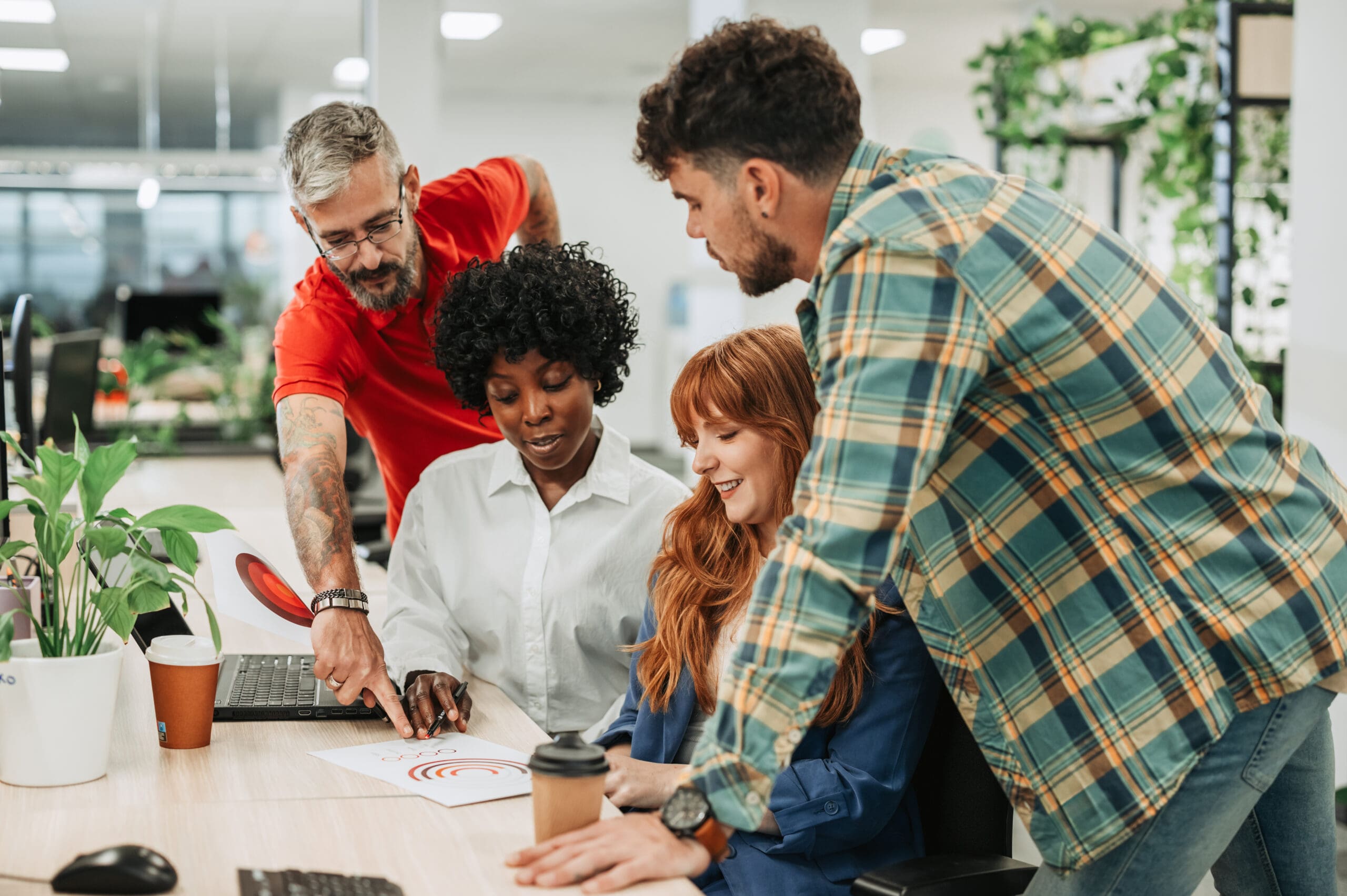 Portrait of diverse business colleagues working together on a bu