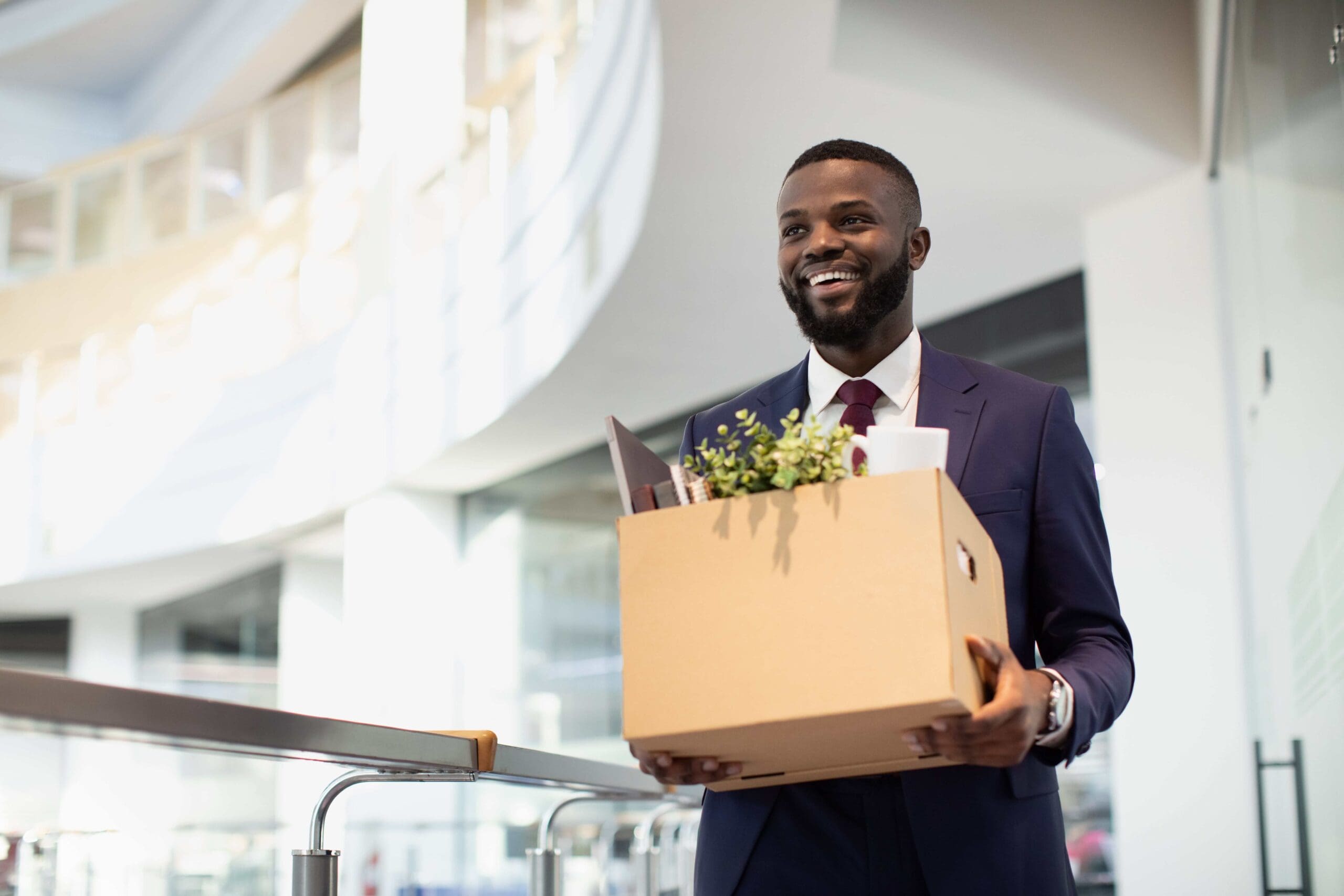 happy-african-american-young-man-with-working-stuf-2025-03-18-15-53-35-utc-min-1