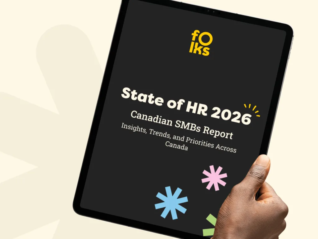 A hand holds a tablet displaying a report titled 